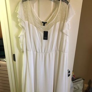 Torrid White dress. Size 4. Never worn. Lace detail at the top. Comes w/ belt